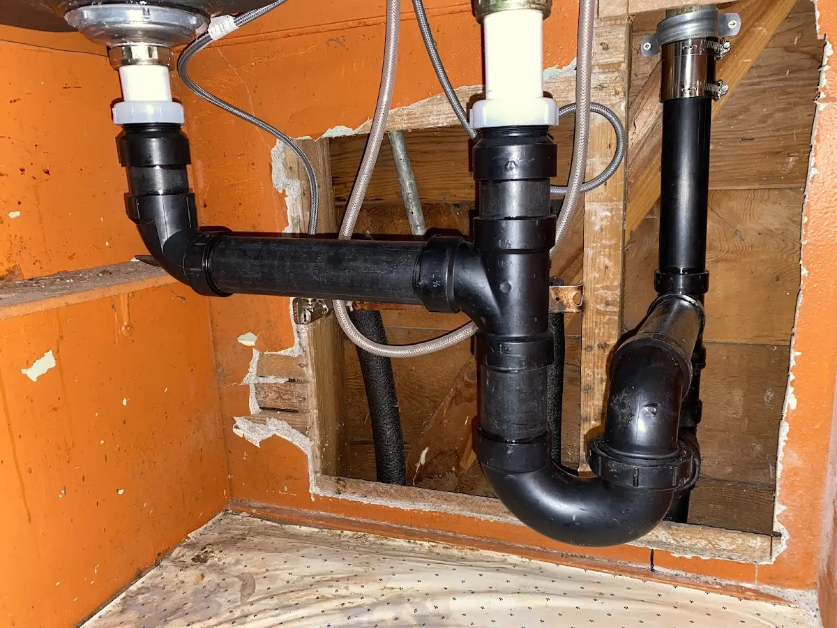 Professional Garbage Disposal Repair equipment and tools on the job in North Strabane